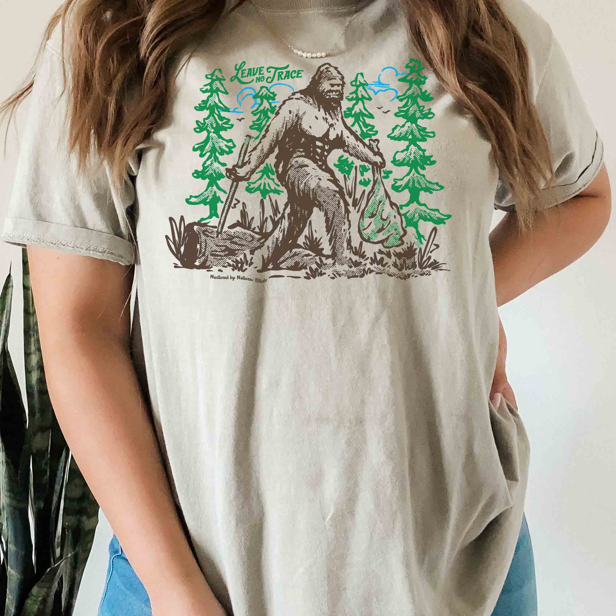 Bigfoot in the Woods Graphic T-Shirt – Back by Sunset