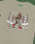 Let It Snow Skiing Bigfoot Sasquatch Graphic T-Shirt Nurtured by Nature Studio
